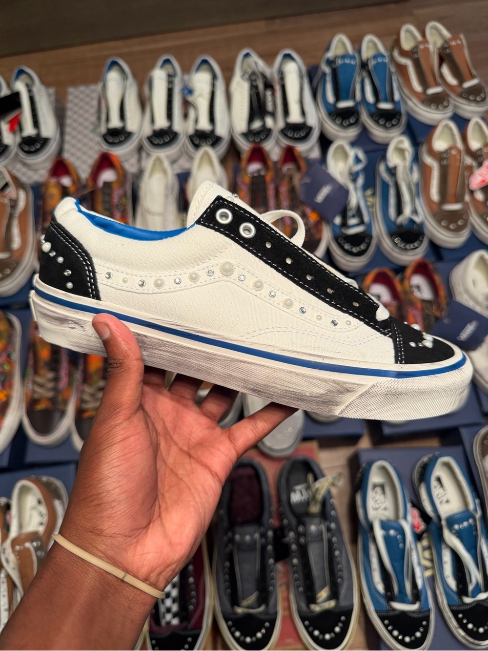 Vans White & Black Studded Low-Top Skate Sneaker with Blue Trim
